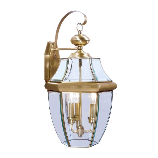 Livex 2351-01 Monterey 3 Light 23 Inch Tall Outdoor Wall Lantern In Antique Brass with Clear Beveled Glass