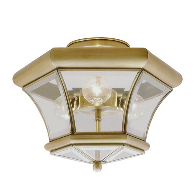 Livex 4083-01 Monterey 3 Light 13 Inch Flush Mount In Antique Brass with Clear Beveled Glass
