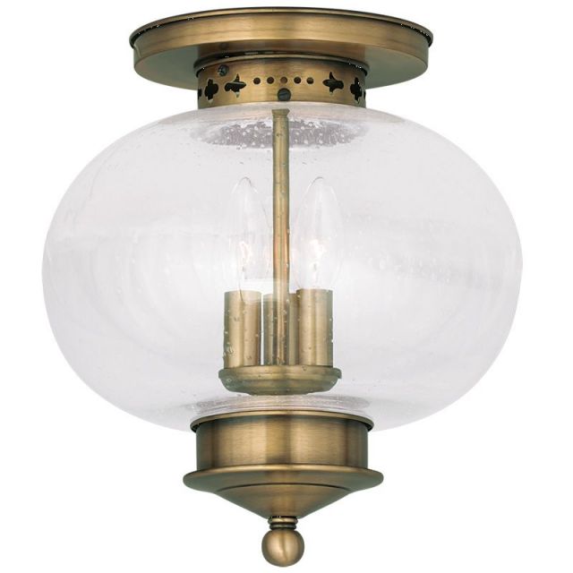 Livex 5037-01 Harbor 3 Light 11 Inch Flush Mount In Antique Brass With Hand Blown Seeded Glass