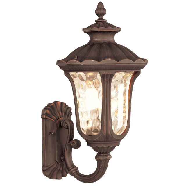 Livex 7656-58 Oxford 3 Light 22 Inch Tall Outdoor Wall Lantern In Imperial Bronze with Hand Blown Light Amber Water Glass