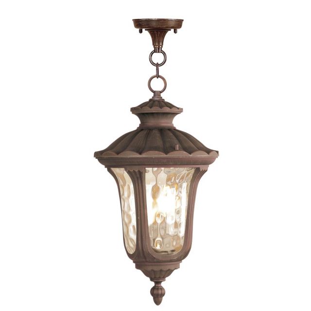 Livex 7658-58 Oxford 3 Light 11 Inch Outdoor Pendant Lantern In Imperial Bronze with Hand Blown Light Amber Water Glass