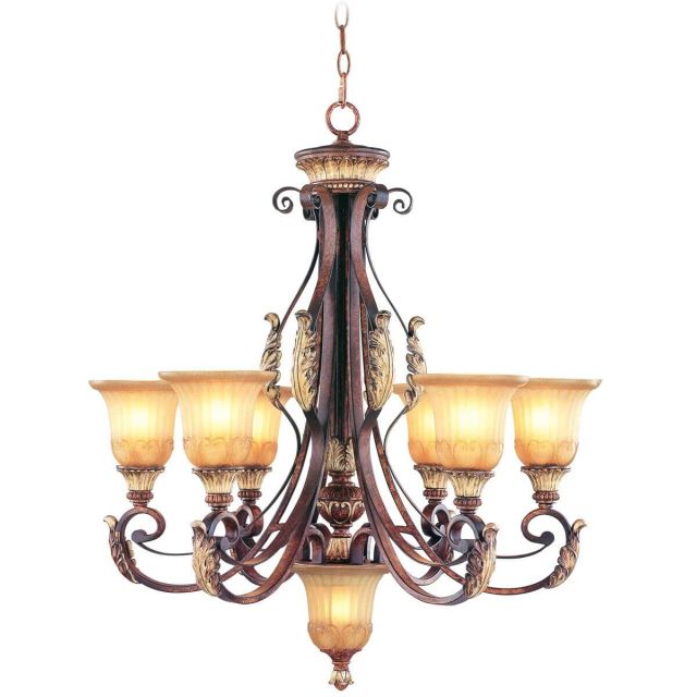 Livex 8576-63 Villa Verona 7 Light 30 Inch Chandelier In Verona Bronze-Aged Gold Leaf Accents And Rustic Art Glass